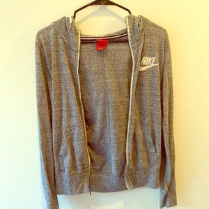 Grey Nike zip-up sweater